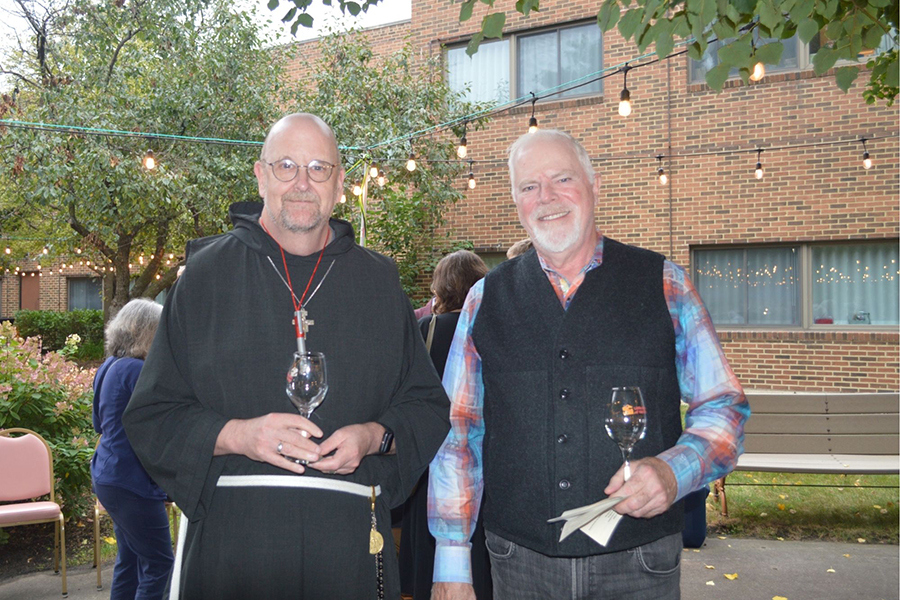CSM Wine Tasting 2026 Photos - Br. Dominic and friend