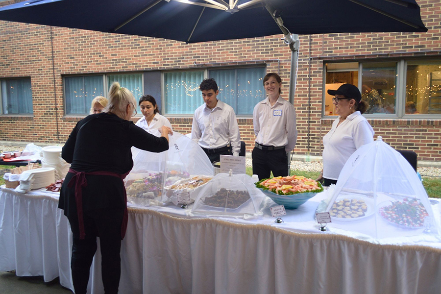 CSM Wine Tasting 2026 Photos - Food Station Setup and Workers